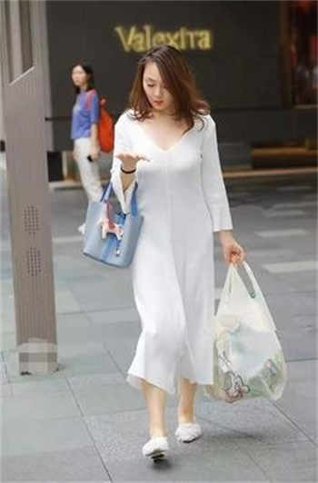 《商务旅行社戴绿帽子的女